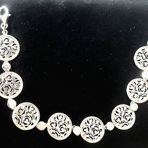 Tous Rosa D'Abril sterling silver bracelet. 7 inch length, diameter 1/2 inch.